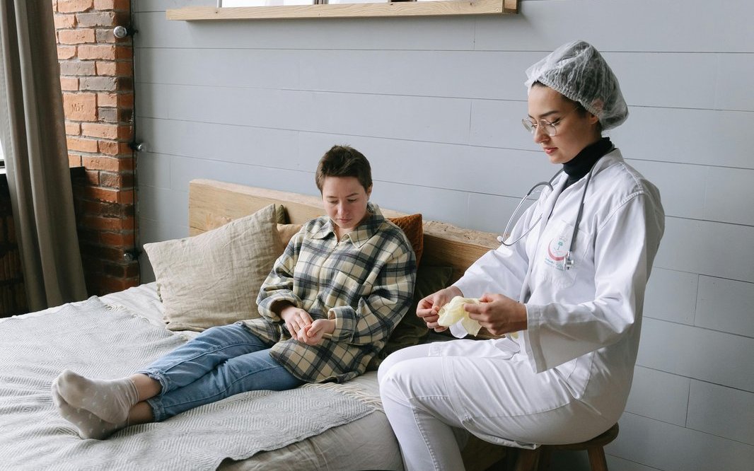 A care professional supporting an older person